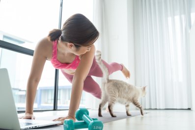 Woman Thinks She's Filming a Nice Workout Video, but Cat Has Other Plans