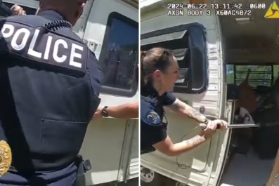 Moment Cops Break Into Scorching Trailer To Save Dog Who Was 100 Degrees